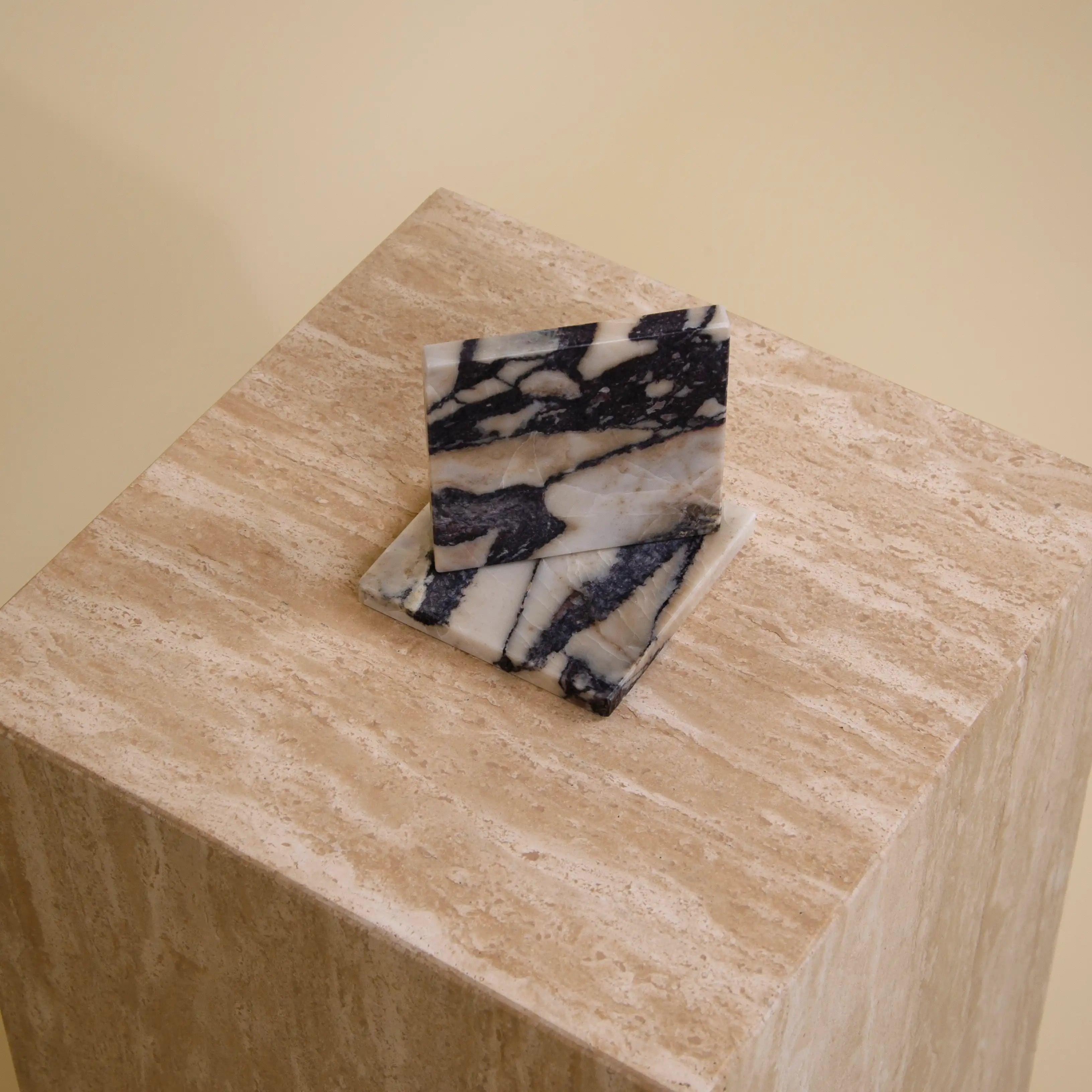 Aesthevore Custos coaster set of 2 viola calacatta marble New York Noblesse interior design home decor styling on travertine table